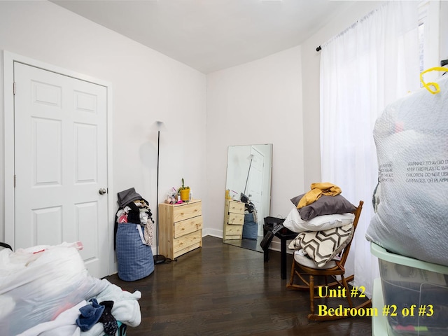 bedroom featuring dark hardwood / wood-style floors