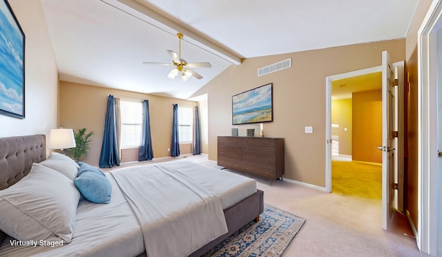 bedroom with vaulted ceiling with beams, light colored carpet, and ceiling fan