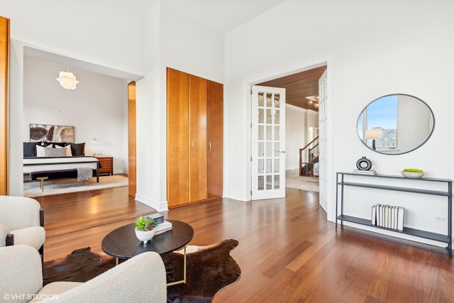 living room with dark hardwood / wood-style floors