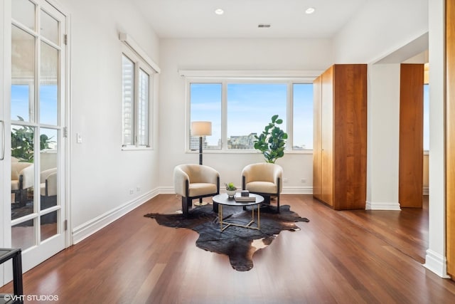 living area featuring hardwood / wood-style flooring