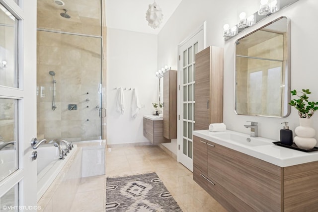 bathroom with vanity, separate shower and tub, and tile patterned flooring