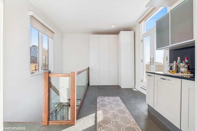 interior space featuring white cabinetry