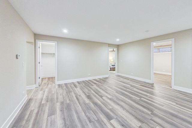 unfurnished room featuring light hardwood / wood-style floors