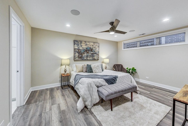 bedroom featuring wood-type flooring and ceiling fan