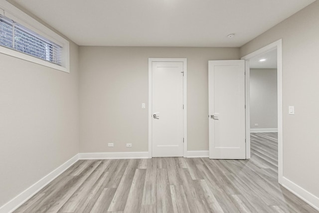 unfurnished bedroom featuring light hardwood / wood-style floors