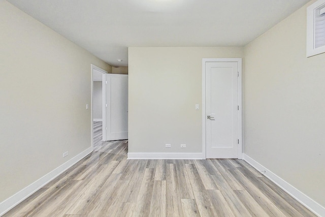 unfurnished bedroom with light hardwood / wood-style flooring