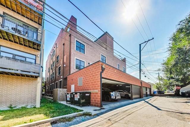 view of building exterior featuring a garage