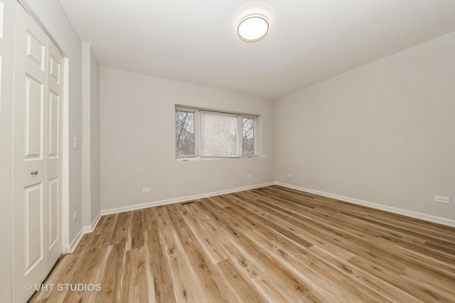 unfurnished bedroom featuring light hardwood / wood-style floors