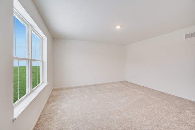 view of carpeted spare room