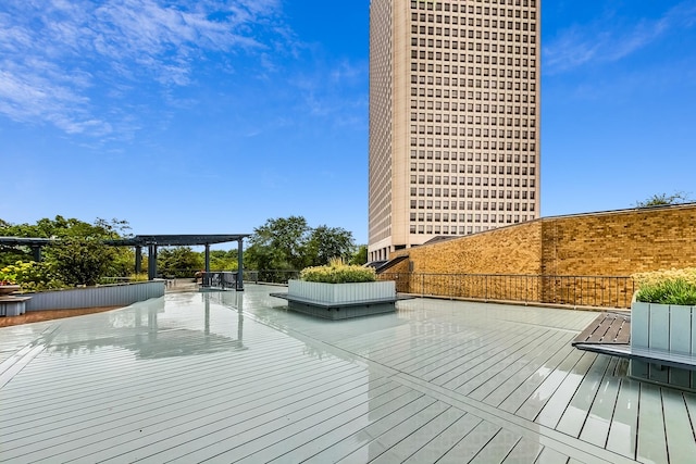 wooden terrace featuring a pergola