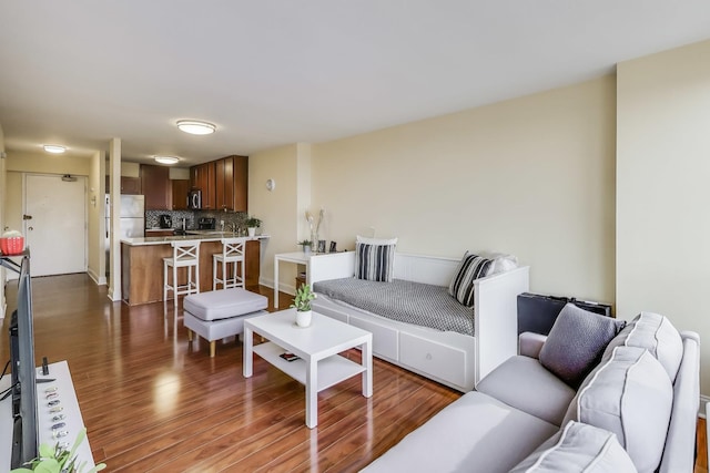 living room with dark wood-type flooring