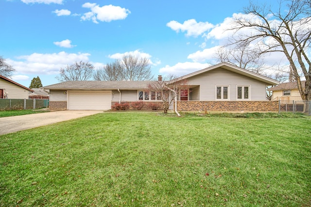 single story home featuring a garage and a front lawn