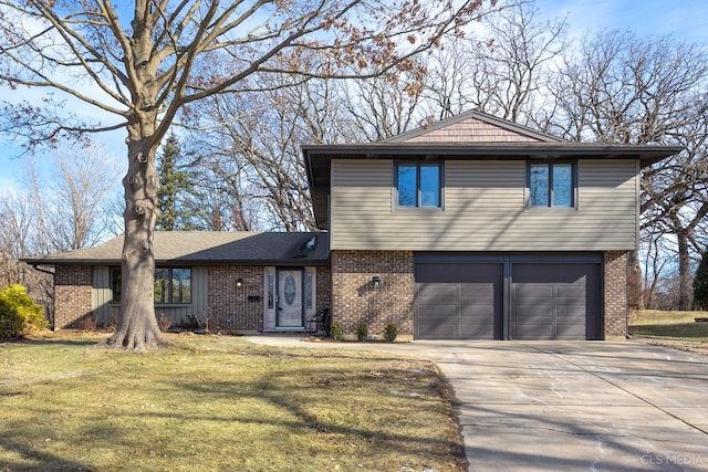 view of front facade featuring a garage and a front yard