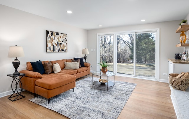 living room with light hardwood / wood-style floors