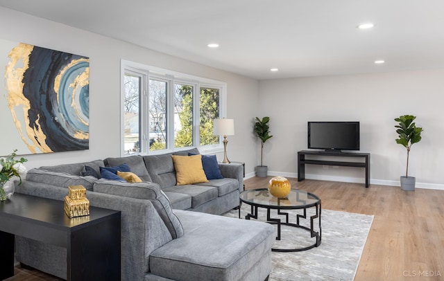 living room with light hardwood / wood-style floors