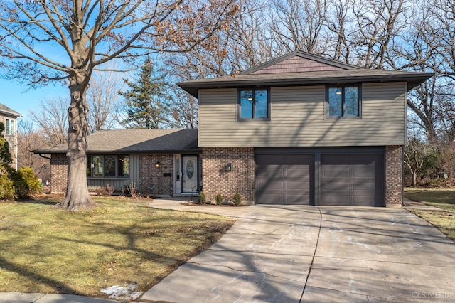 view of front of home with a garage and a front yard