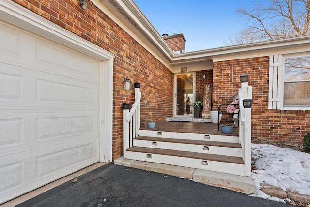 entrance to property with a garage