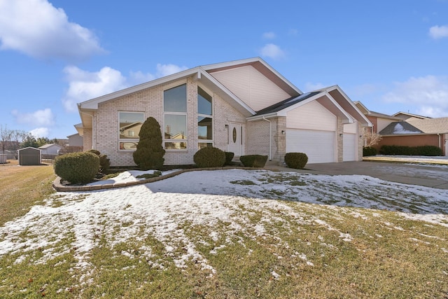 view of property with a garage and a yard