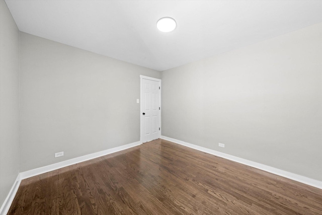 empty room featuring dark hardwood / wood-style floors