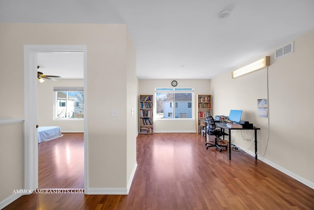 office space with hardwood / wood-style floors