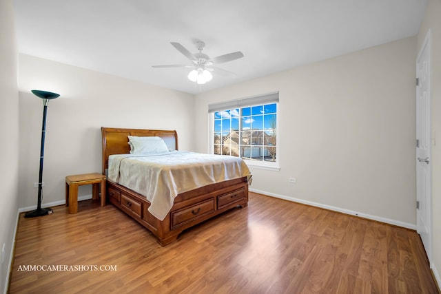 bedroom featuring ceiling fan and light wood-type flooring