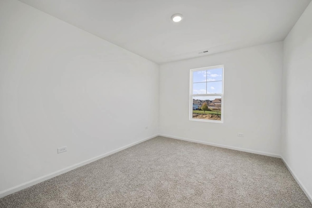 unfurnished room with carpet