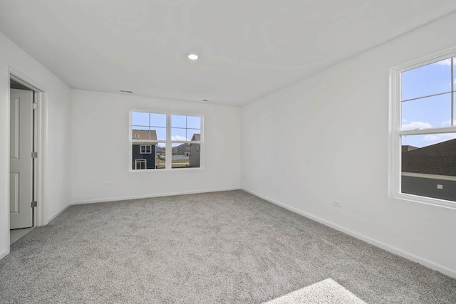 view of carpeted spare room