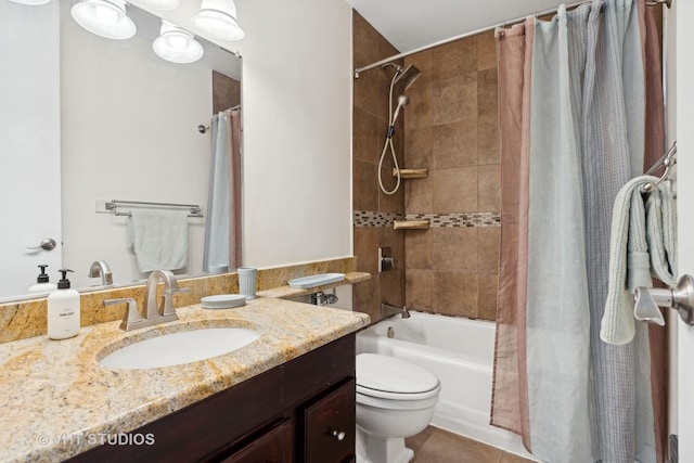 full bathroom with tile patterned flooring, vanity, shower / tub combo with curtain, and toilet