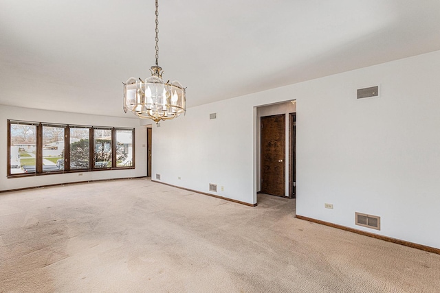 627 Paxton Ave, Calumet City, IL 60409 - unfurnished room with baseboards, visible vents, an inviting chandelier, and light colored carpet
