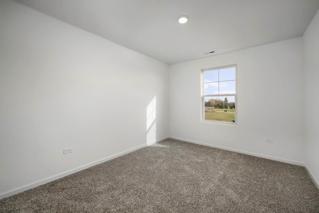 view of carpeted spare room