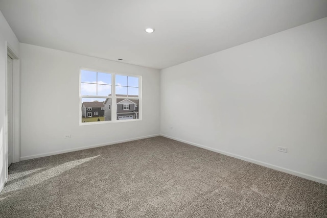 view of carpeted spare room