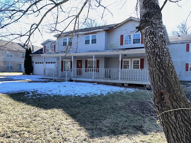 view of front of home featuring a garage and covered porch