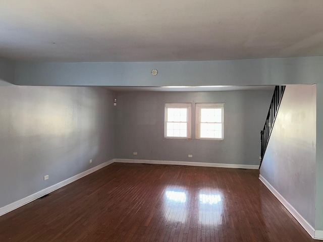 empty room featuring dark hardwood / wood-style floors