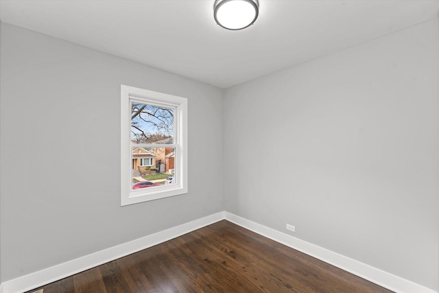 spare room featuring hardwood / wood-style flooring