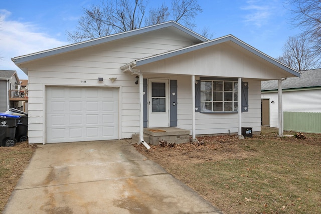 view of front facade with a garage and a front yard