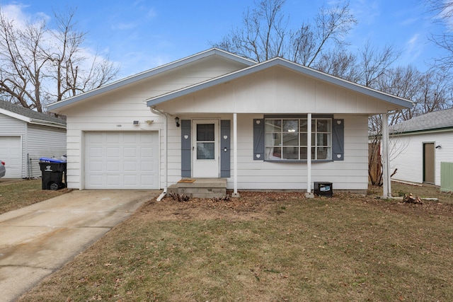 view of front facade featuring a garage and a front yard