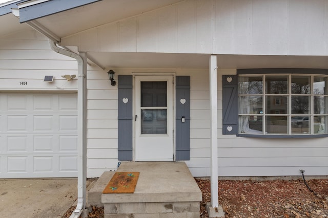 property entrance with a garage