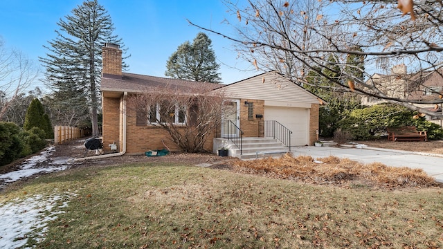 view of front facade with a garage and a front yard