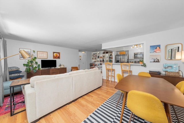 living room featuring light wood-type flooring