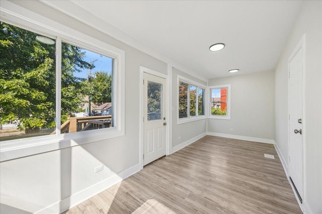 view of unfurnished sunroom