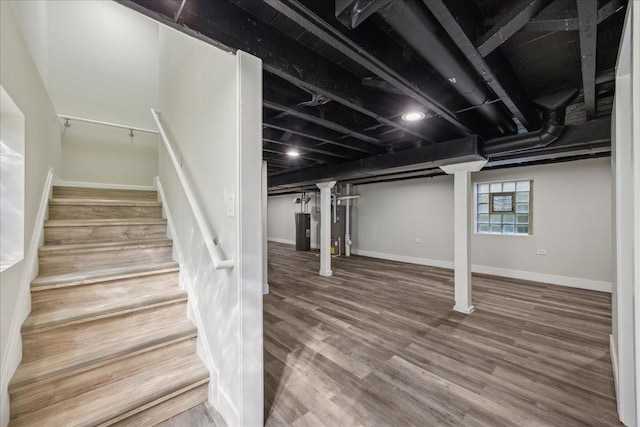 basement featuring wood-type flooring