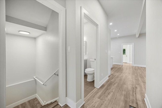 corridor featuring light hardwood / wood-style flooring