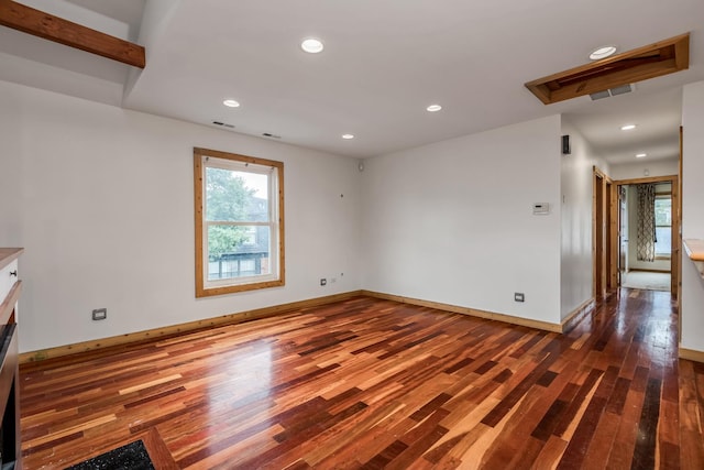 empty room featuring dark hardwood / wood-style floors