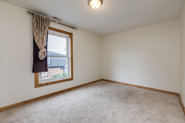 view of carpeted spare room