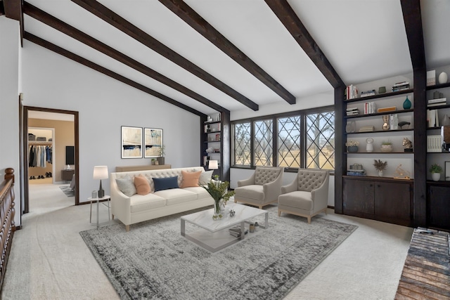 carpeted living room featuring vaulted ceiling with beams