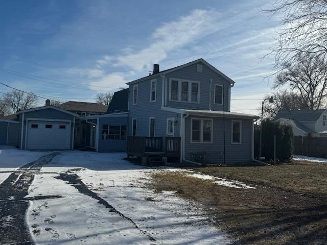 front of property featuring a garage