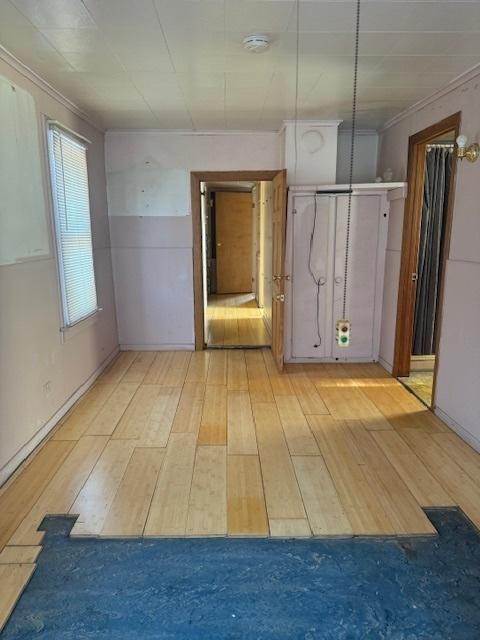unfurnished room featuring hardwood / wood-style flooring