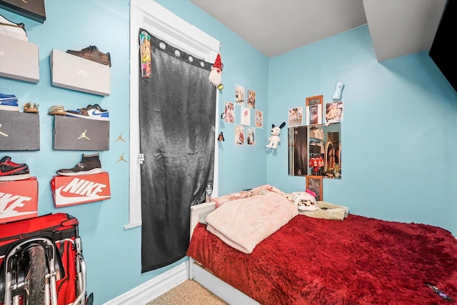 bedroom featuring carpet