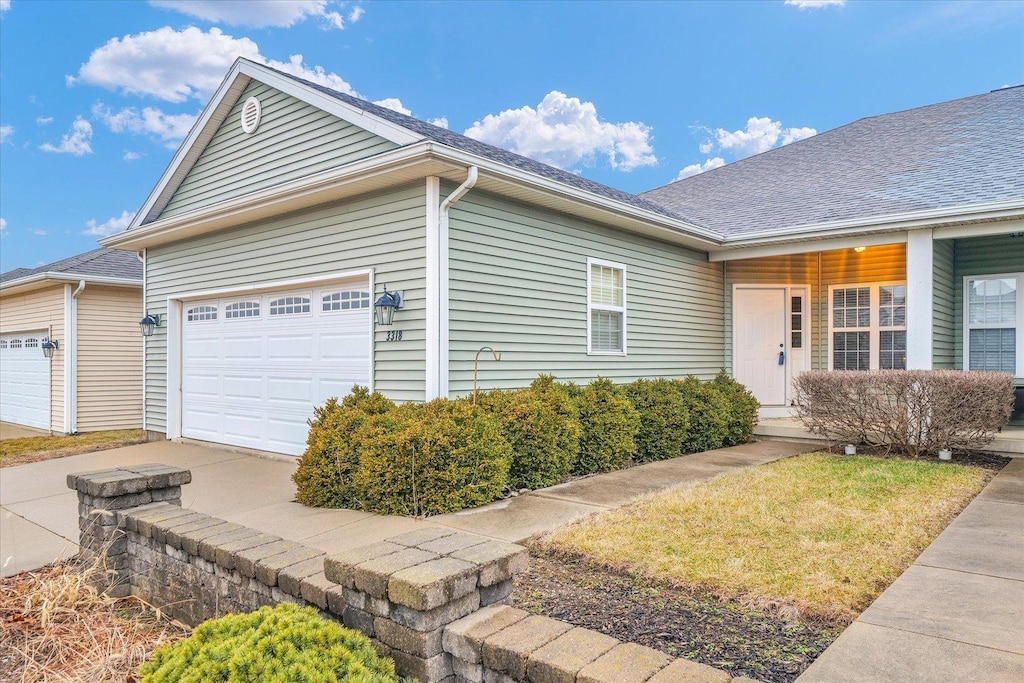 view of property exterior with a garage