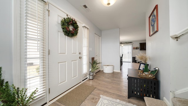 entryway with light wood-type flooring